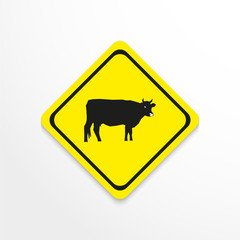 Cow on a yellow background. Vector icon.