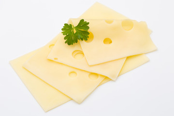 Cheese slices on white background cutout.