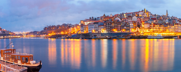 Ribeira and Old town of Porto with mirror reflections in the Douro River during evening blue hour, Portugal, Portugal. - obrazy, fototapety, plakaty