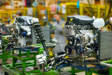New manufactured engines on assembly line in a factory.