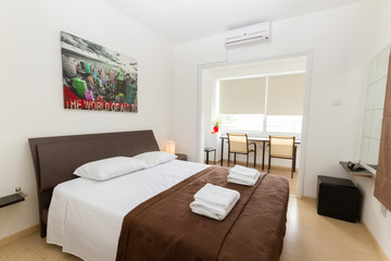Fototapeta na wymiar Modern Bedroom in Wenge and White colors