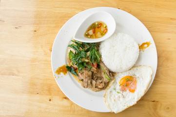 Grilled pork basil with Fried egg , stir basil with crispy pork , Kind of favarite Traditional Thai foods
