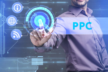 Business, Technology, Internet and network concept. Young businessman working on a virtual screen of the future and sees the inscription: PPC