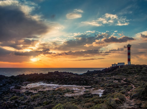 Sunset and lighthouse. Tenerife. Canary Islands, Spain
