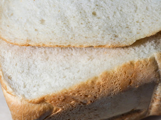 Cut fresh bread. White bread crumb.