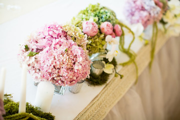 Close up view at flower decorations for holidays and wedding dinner