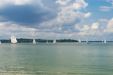 white sailing boats in the coming storm on Changi Singapore