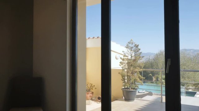 Modern bedroom with panoramic windows and beautiful view