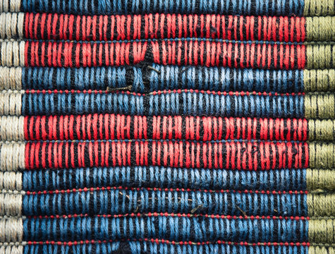 detail red blue carpet weaving