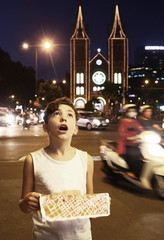 preteen boy with map in the ho shi mihn city