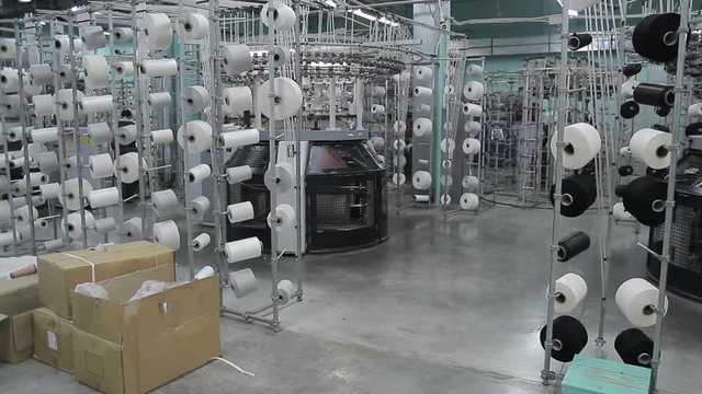 Industrial knitting machine at work