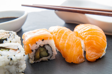 slate plate with sushi food
