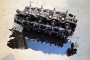 The head of the block of cylinders. The head of the block of cylinders removed from the engine for...