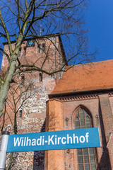 Street sign in front of the Wilhadi church in Stade