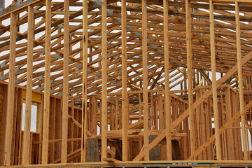 Wood frame residential building under construction.