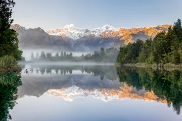 Wall murals Reflection Southern alps with Mount Cook and Mt. Tasman reflected in Lake Mathesson, New Zealand