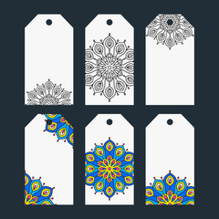 Set of six printable tags with hand drawn decor. Isolated. Collection of label with doodle mandala ornament. Outline and color elements. White, blue, yellow, black and pink colors. - 143344621