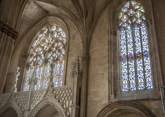 Obraz premium Portugal, Batalha. Monastery of Santa Maria da Vitoria.The interior of the cathedral is a magnificent stone carvings, colorful stained glass windows.