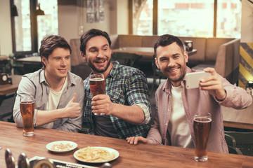 Friends having fun in pub