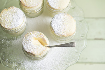 desserts on green back ground and spoon