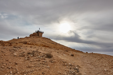 Israeli flag in the top of a mountain