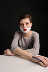 Young woman posing as a man