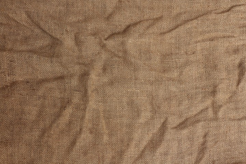 The bast mat bagging crumpled rough material. The top view. Focus on full width.