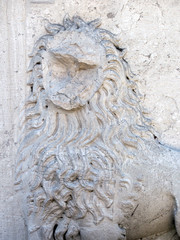 eroded lion sculpture