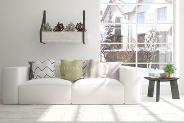 White room with sofa and winter landscape in window. Scandinavian interior design. 3D illustration