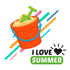 Beach toy bucket and text. 