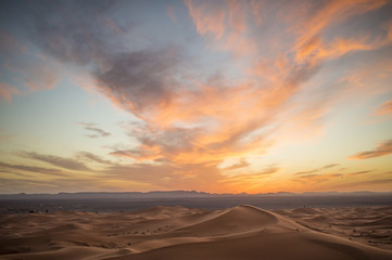 Fototapeta na wymiar Sand dunes of the Sahara desert at sunset - Merzouga - Morocco