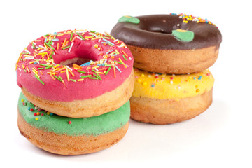 pile of glazed donuts isolated on white background