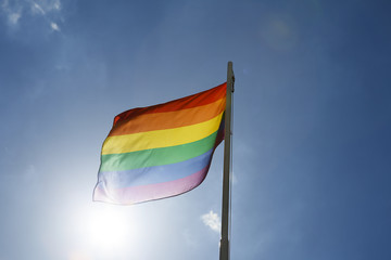 Rainbow flag on a flagpole
