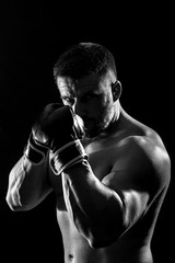 Fototapeta na wymiar Studio shot of male boxer.