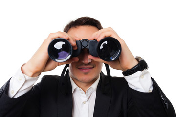 young man in a suit on a white background showing signs