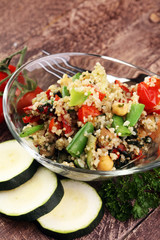 Delicious vegetarian quinoa salad with bell pepper, cucumber and