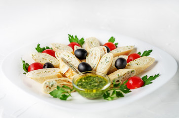 Pancake with feta cheese and herbs on a white background. The concept of healthy eating and vegetarianism.