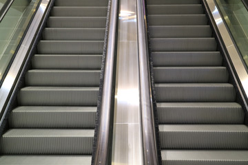 Modern style double escalator staircase in a shopping mall 