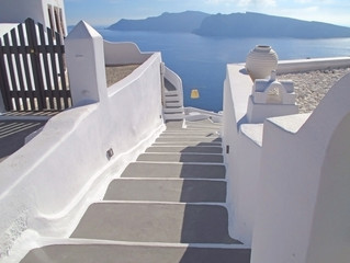 White Stone Stairway to the Blue Sea, Oia Village on Santorini Island of Greece