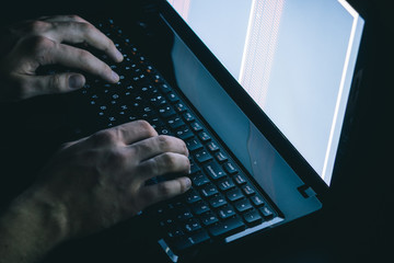 Russian hacker hacking the server in the dark