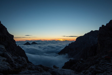 Sunrise above the clouds, Dolomites, Italy