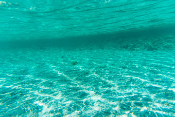 Fototapeta na wymiar Underwater shoot of an infinite sandy sea