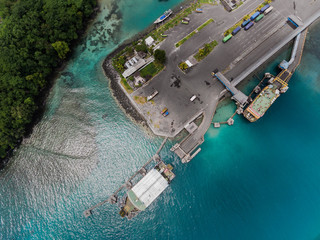 Aerial shot of the town of Padang Bai with marine port. Bali, Indonesia