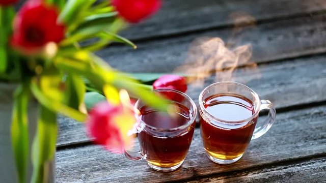 tea and milk on the wood backround