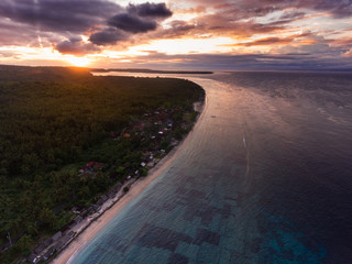 Aerial panorama of the coast of the island of Nusa Penida at sunset, Bali, Indonesia