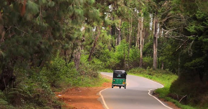 Tuk-tuk auto rickshaw taxi in Sri Lanka. Traditional transportation in Asia