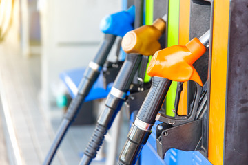 Colorful fuel pumps/Fuel nozzle at gas station in Thailand