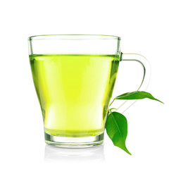 Cup of tea and green leaves isolated on white