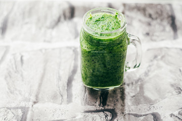 green smoothie of spinach, banana and Chia seeds.  The concept of summer and holiday