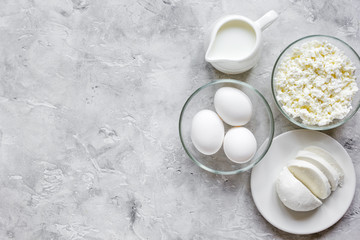 dairy products for proteic meal on grey background top view mockup